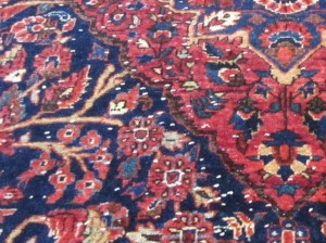 White knots on an oriental rug