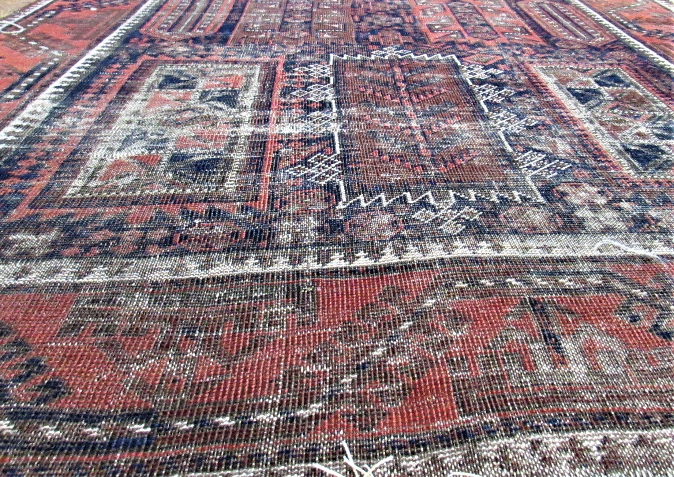 faded worn rug