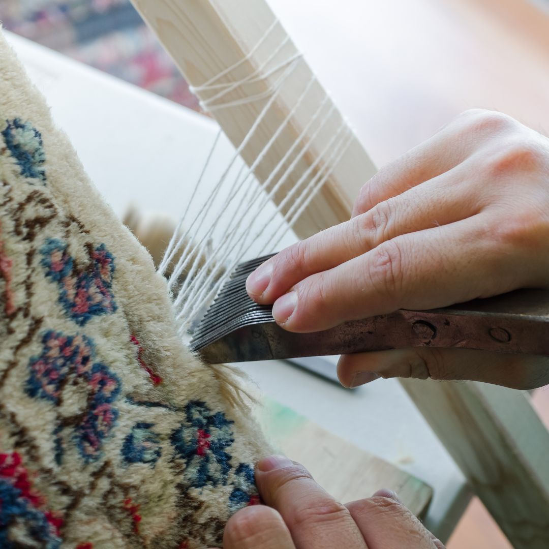 image of a rug being repaired