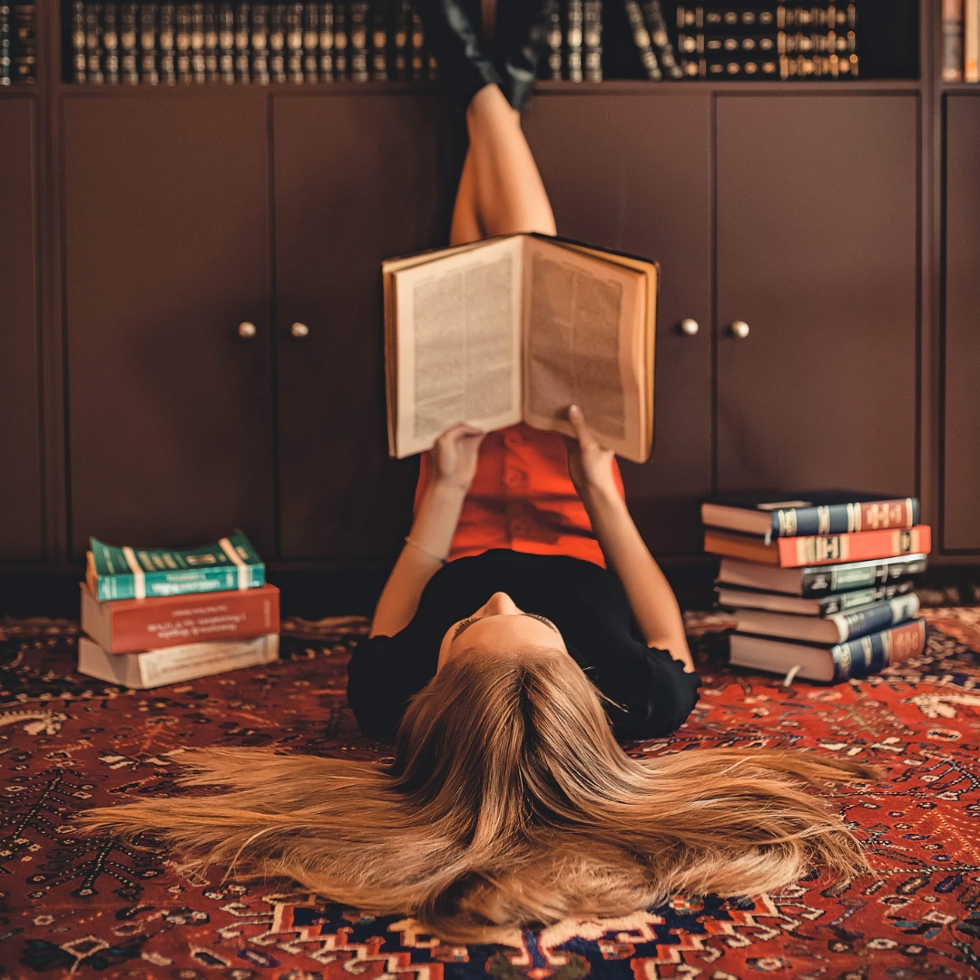 image of a woman enjoying a repaired rug