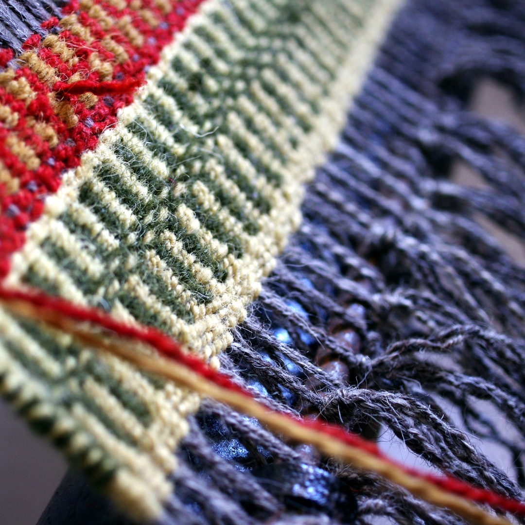 image of a rug being reweaved