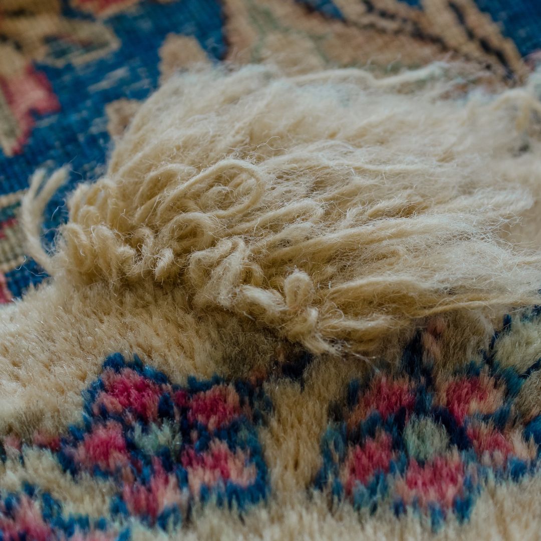 image of a rug being repaired