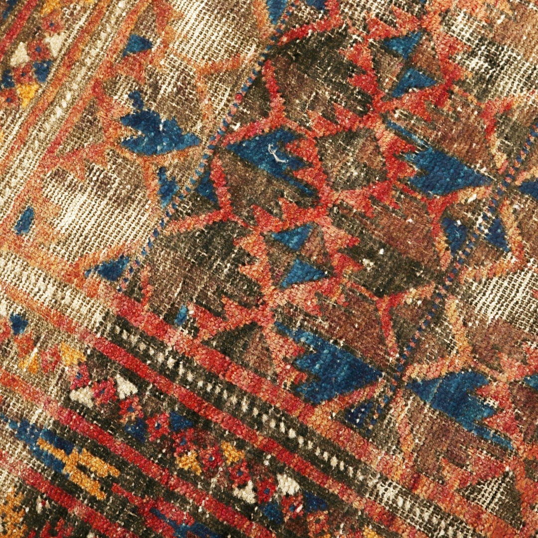What Is Rug Tip Shearing image of a worn rug