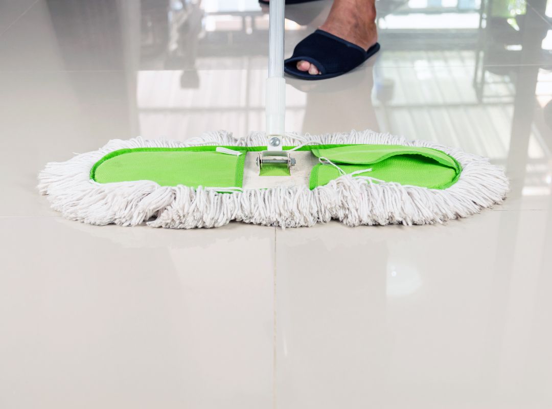 Image 1 Mopping tile floor