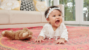 smiling baby on oriental rug